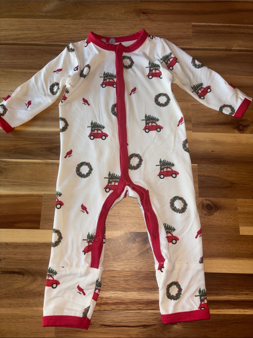 Kyte BABY White One-Piece with Red Trim and Holiday Car Print